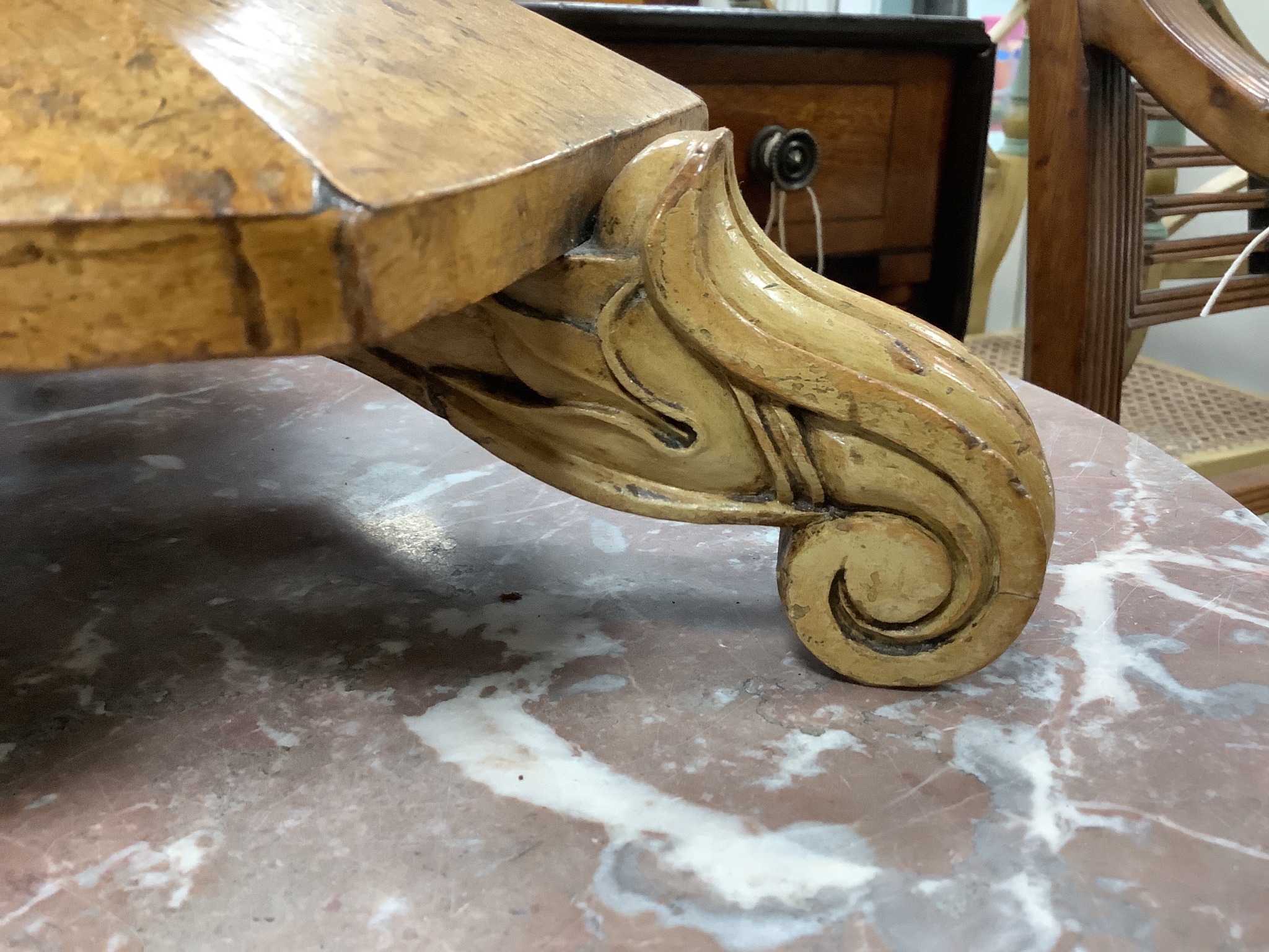 A 19th century bird's eye maple cane seated dressing stool